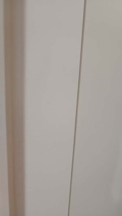 Bloc-porte fini invisible flat âme tubulaire 78cm blanc 201.5cm rév.
