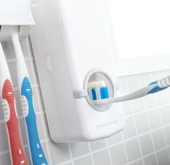 Distributeur de dentifrice avec support pour brosse à dents